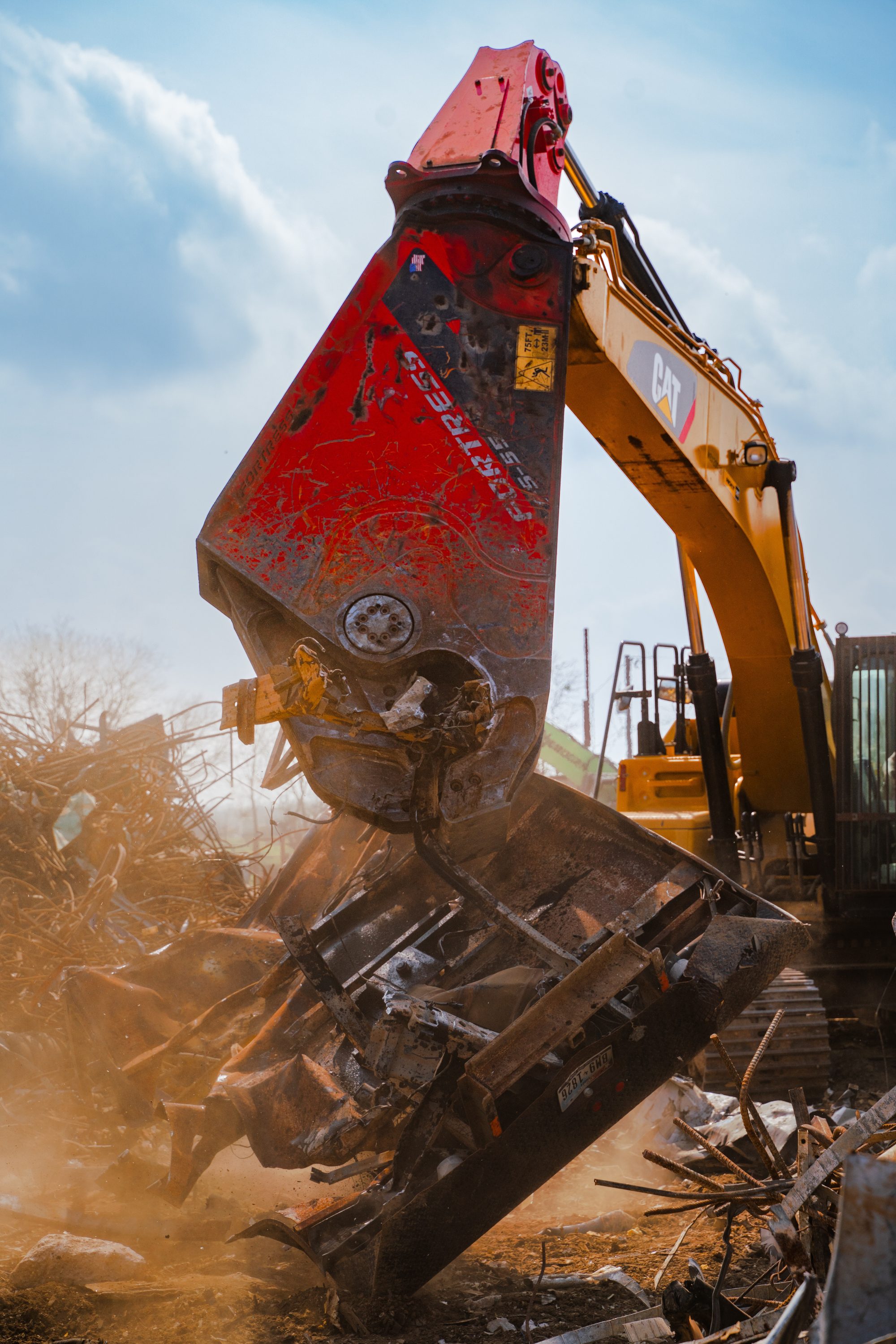 A demolition shear processing scrap
